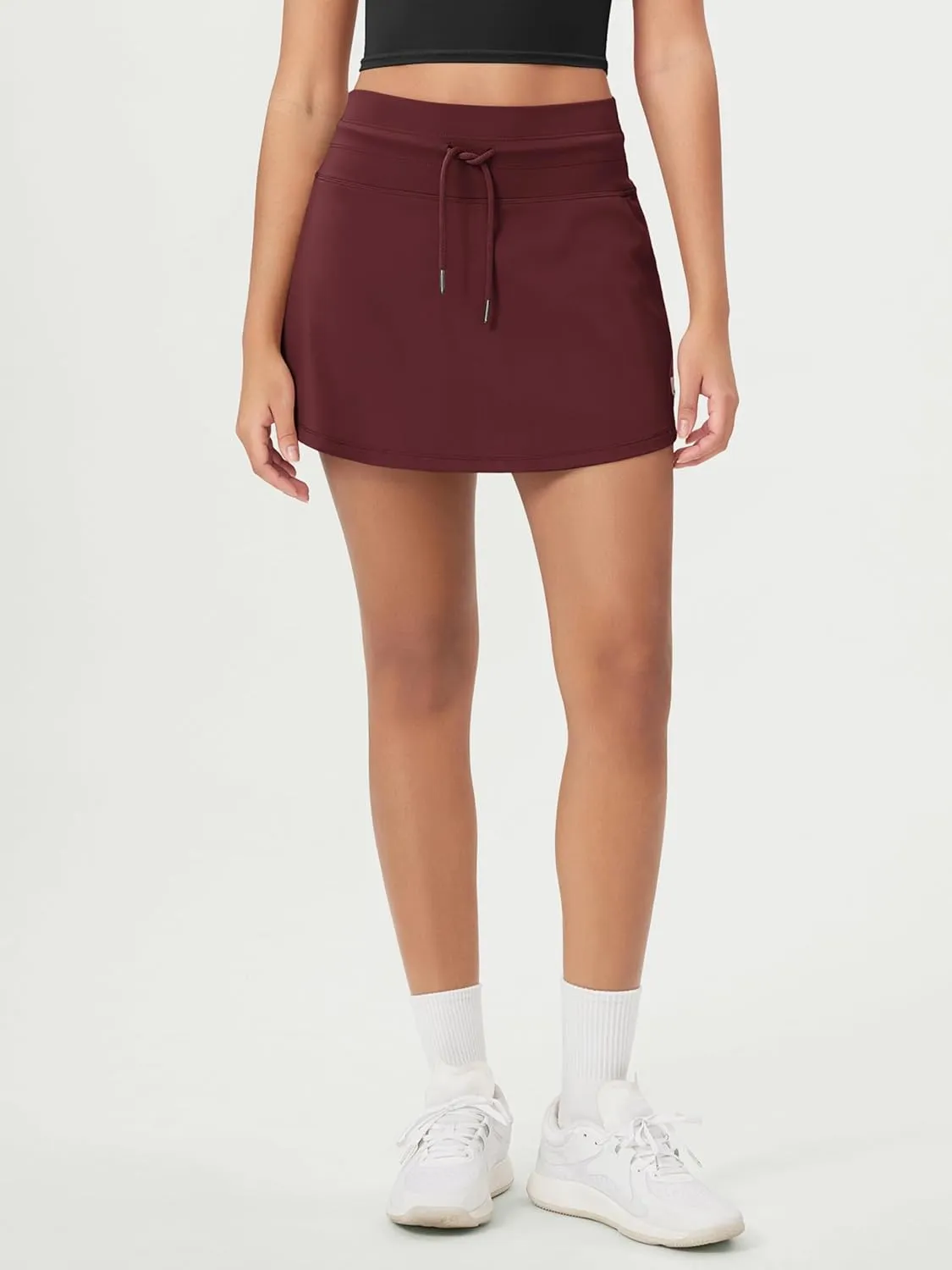 ODODOS Women's Drawstring Tie Daily Skirts Built-in Shorts Athletic Golf Tennis Skorts with Ball Pocket