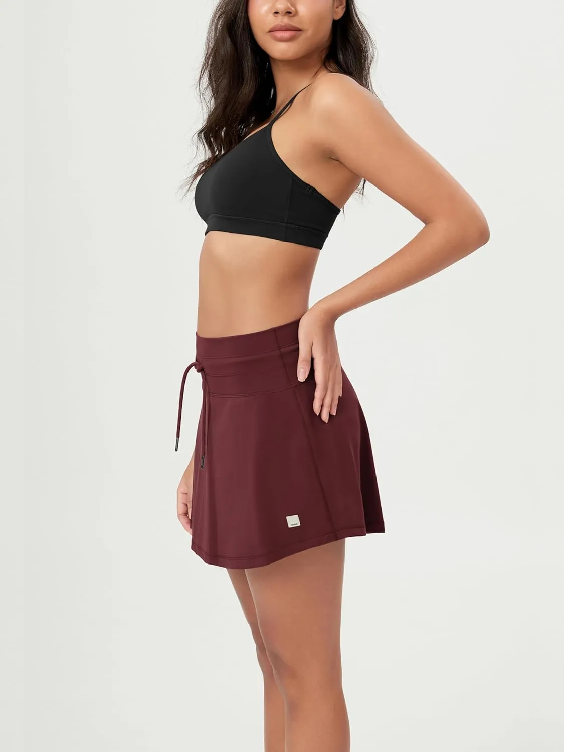 ODODOS Women's Drawstring Tie Daily Skirts Built-in Shorts Athletic Golf Tennis Skorts with Ball Pocket